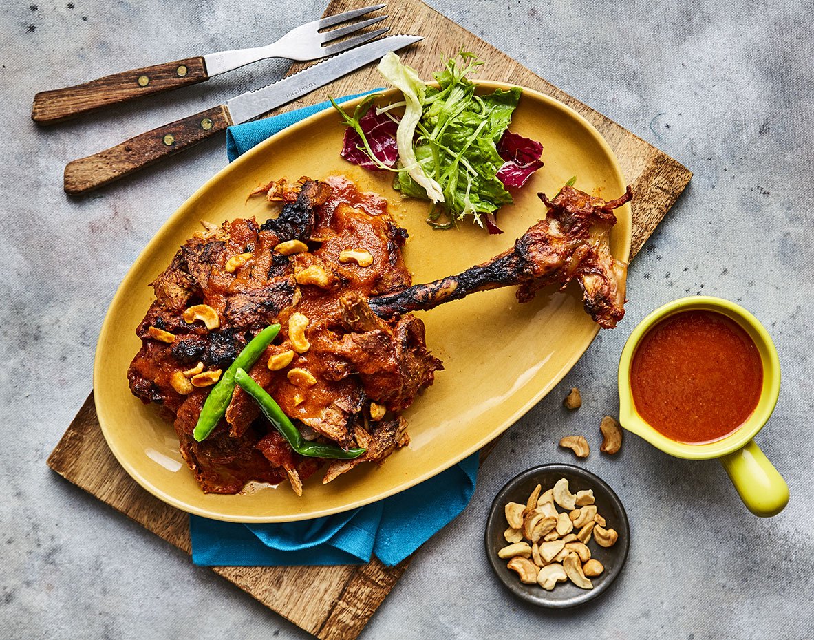 Raan Irani — a whole leg of lamb, roasted and carried to the table